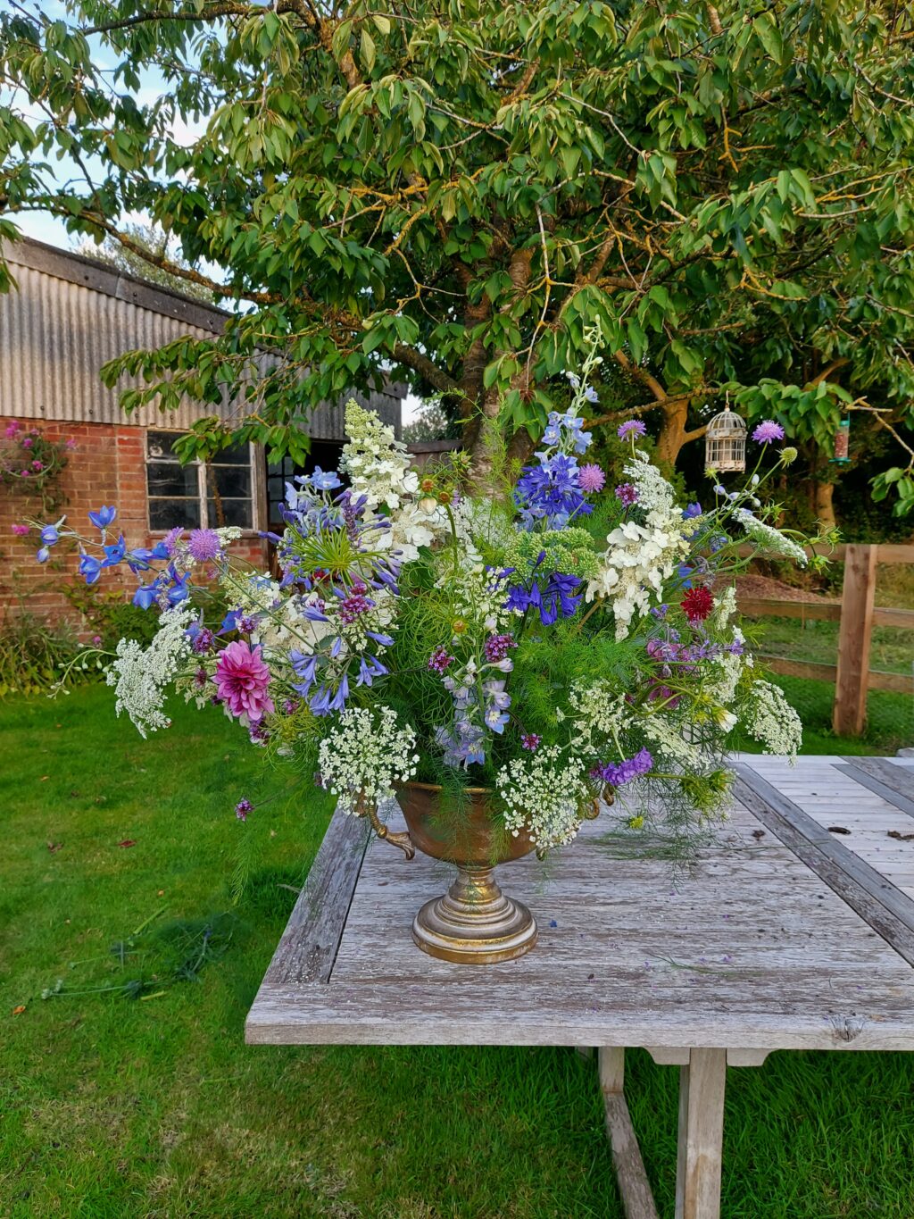 A beautiful urn arrangement made by Louisa Butcher of Brunstead Blooms using sustainable mechanics