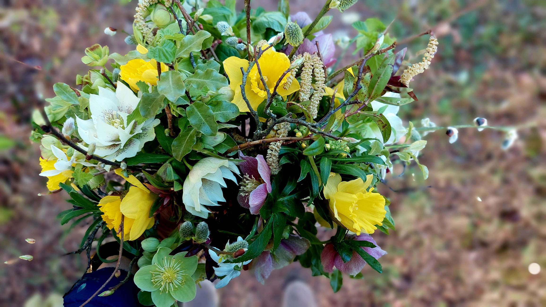 This beautiful late winter bouquet by Kathryn Hurst contains hellebores, daffodils and snowdrops, along with evergreen foliage, hazel and willow.