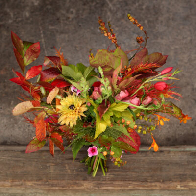 A fiery leafy woodland bride's bouquet for autumn wedding flowers