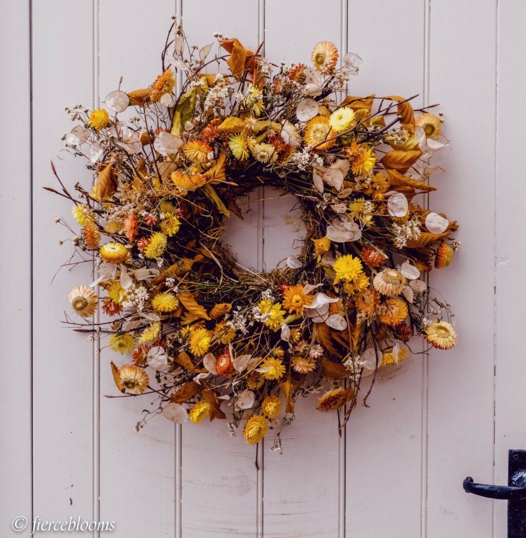 An autumnal wreath with dried helichrysums inspired by the outdoors. Fierceblooms, Cheshire.