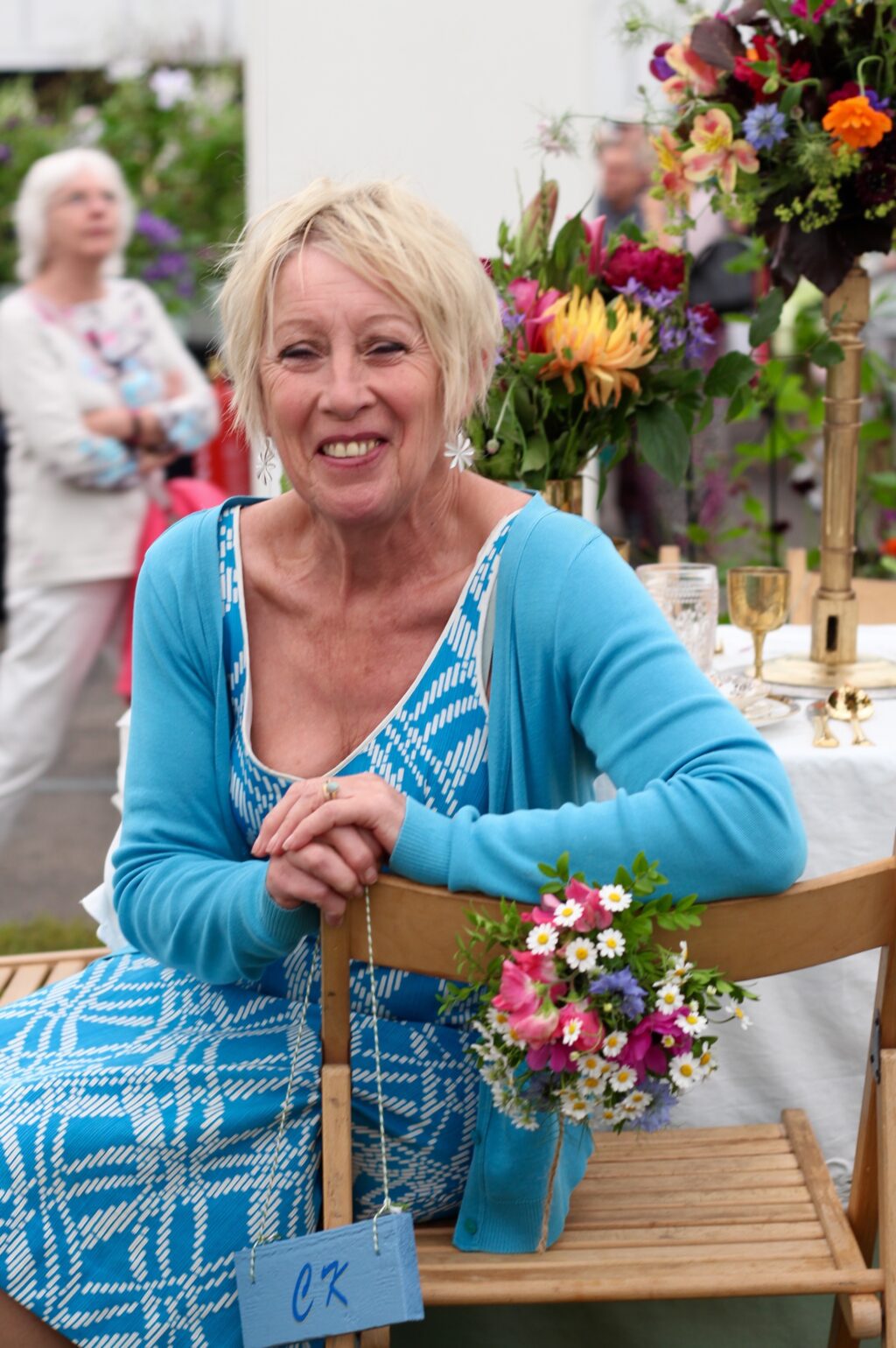 Carol Klein sits in her birthday chair at BBC Gardeners'World Live