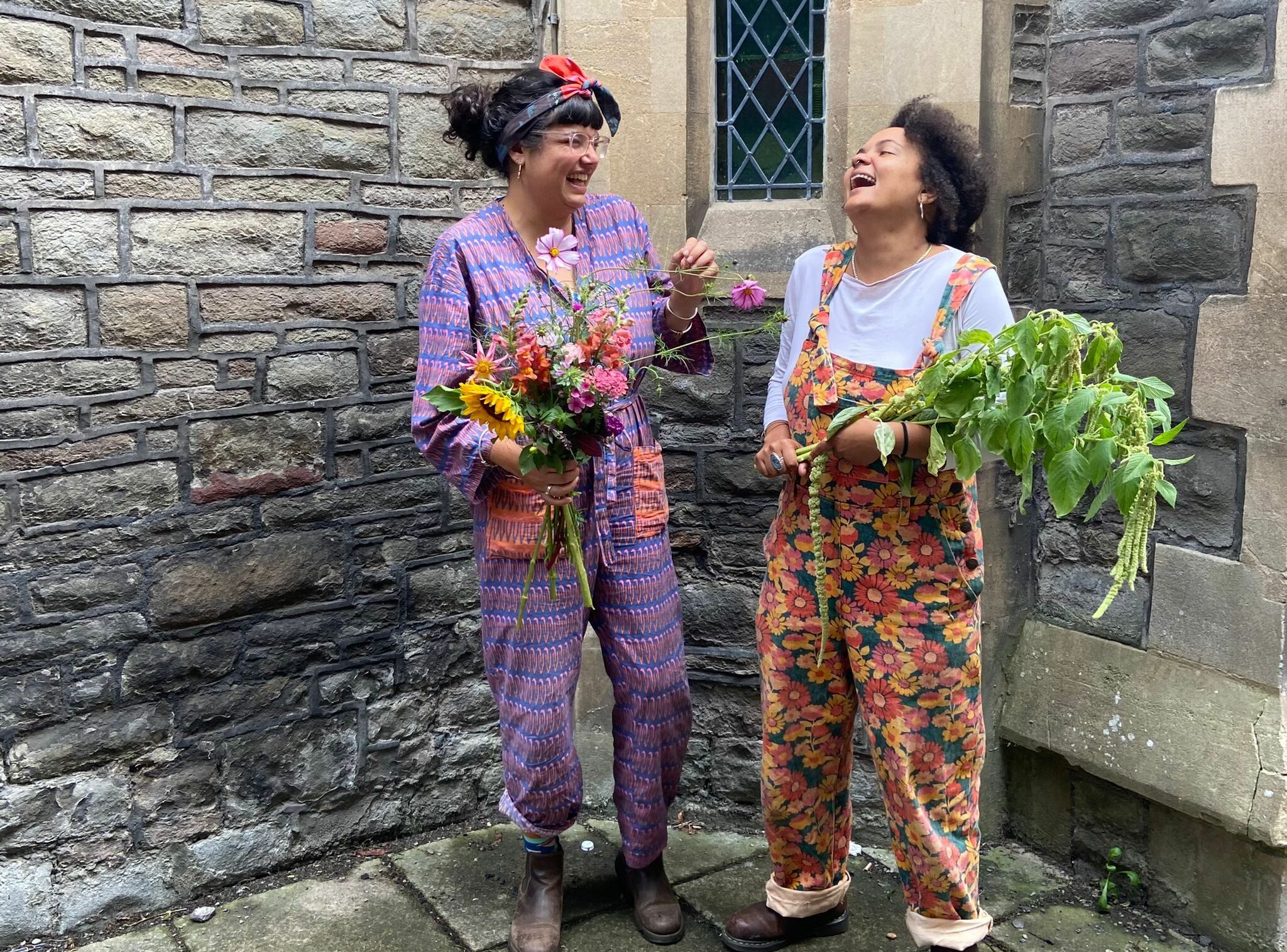 Sarah Barnes and Elsie Harp share a joke in this promotional shot for their collaboration with the We Are Bread and Roses refugee programme