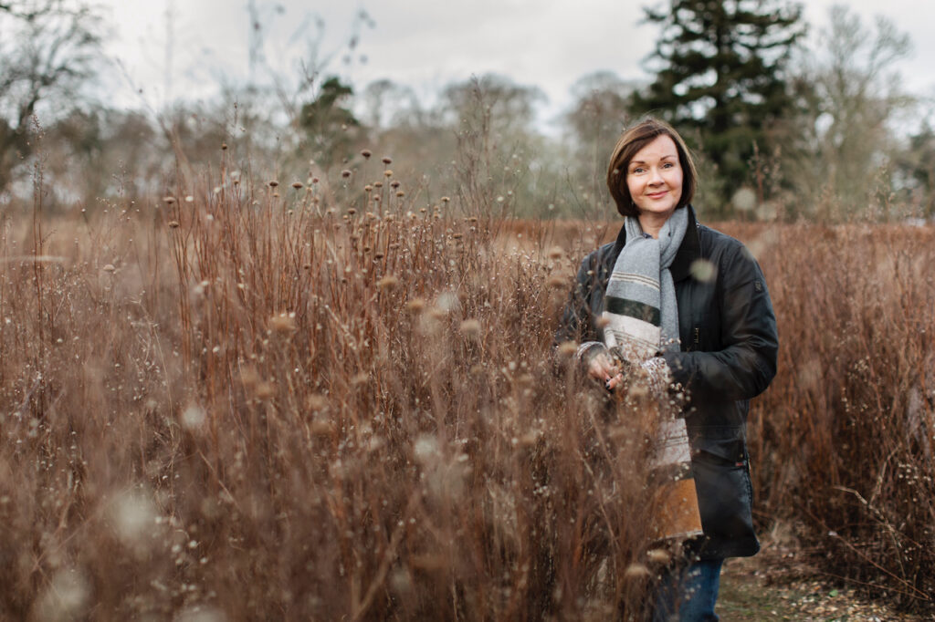 Simply by Arrangement's Sarah Statham in an autumn field. she loves the faded tones of this season.