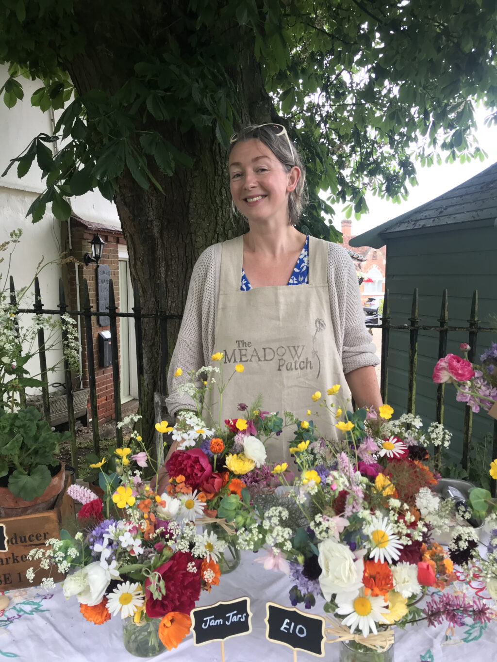 Victoria Uff of The Meadow Patch selling locally grown British flowers at her market stall