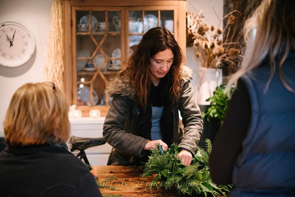 Emma of Urban Flowers teaches a workshop about making Christmas wreaths with seasonal British grown foliage.
